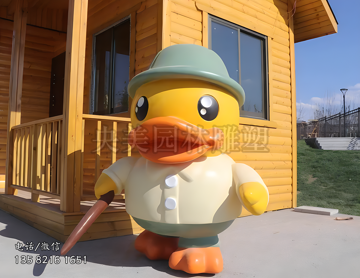 手持拐棍頭戴禮帽的卡通鴨子雕塑
