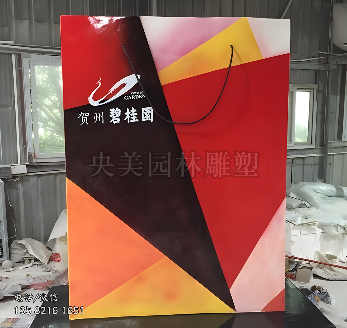 不銹鋼彩繪購物袋雕塑